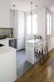 Dashing modern industrial single wall kitchen idea for the small apartment. This Chic Paris Apartment Is A Perfect Mix Of Old New Small Apartment Kitchen Kitchen Design Small Kitchen Remodel Small