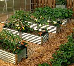 Following are her instructions, reprinted with permission. Corrugated Metal Garden Beds Metal Garden Beds Vegetable Garden Design Building Raised Garden Beds