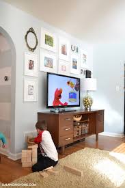 Tv Gallery Wall And A Pen Paint Giveaway Balancing Home Home Tv Gallery Wall Home Living Room