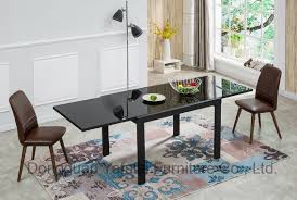 Glass top dining room sets are contemporary, easy to clean and pleasing to the eye. China Modern Factory Extension Black Oil Glass Metal Dining Table Set Furniture China Black Oil Glass Table Dining Table Set