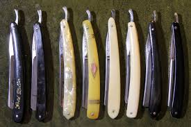 Classic straight razor that features a single carbon steel blade attached to a mahogany handle. Different Types Of Straight Razors Grinds Points Notches Designs