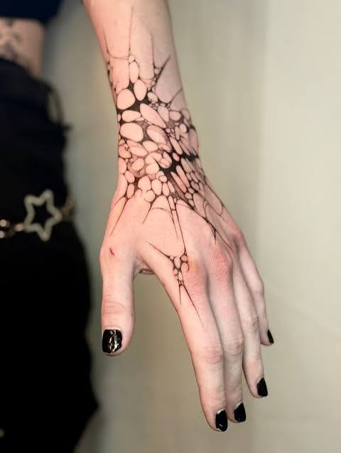 Web tattoo hand | Hand webbing tattoo, Design tattoo art, Cool tattoos
