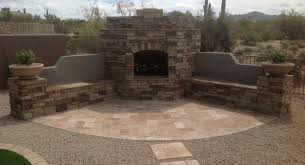 Jot dimensions down in notepad using pencil. Stone Travertine Outdoor Fireplace Scottsdale Landscaping Desert Crest Llc