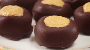 Buckeye fudge is named for the buckeye candies, which are peanut butter balls dipped in chocolate. Buck Eye Truffle Peanut Butter Balls Buckeyes Tastes Better From Scratch Buck Eye Feeders Birmingham Al Mercedes Black White