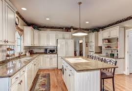 Paint the glaze on a few cabinet doors or drawers at a time. How To Glaze Kitchen Cabinets Diyer S Guide Bob Vila