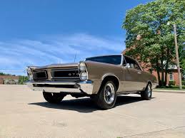 Image result for Capri Gold 1965 Pontiac