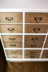 Use wood glue and 1 staples in a brad nailer attach the drawer fronts to the front of the cabinet. Ikea Dresser Hack Faux Card Catalog Love Renovations