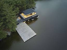 Arrive to discover limitless luxury, scenic views of lake rosseau and convenient access to a variety of muskoka's celebrated outdoor activities. Lake Rosseau Boathouse By Akb Architects Homeadore