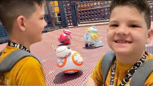 CALEB Builds a DROID ROBOT in Galaxy's EDGE! Disney Family Day at  DisneyWorld! Racing DROIDS