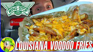 Eating wingstop spicy chicken wings! Wingstop Louisiana Voodoo Fries Food Review Youtube