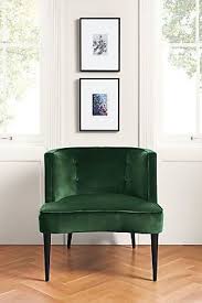 The Curved Button Tufted Back Of This Small Scale Accent Chair Offers Surprising Modern Furniture Living Room Living Room Chairs Accent Chairs For Living Room