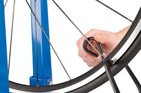 The class usually lasts for two full days and provides complete instruction on how to build a set of custom bicycle wheels that are planned and designed beforehand through discussions with each student. Wheel Truing Lateral Radial Park Tool
