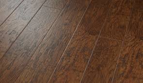 Hickory laminate floors are recognized for their natural wood features and deep textures, and they're often mistakable for authentic hardwood. Rustic Gunstock Hickory Laminate Flooring