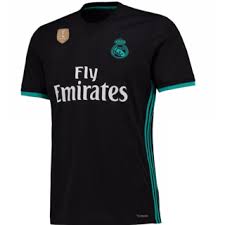 The teal jersey has a pixelated digital graphic in the upper left and lower right. Buy Real Madrid Away Kit 2017 18 Online 1199 From Shopclues