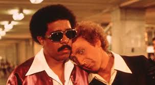 Tony Curtis & Roger Moore, an unlikely pairing but it worked well in ' The  Pursuaders ' with help from a fabulous theme tune from the great John Barry  , taking time