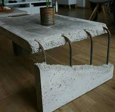 Title A Concrete Table Design A Raw Concrete Slab Turned To Form A Center Piece Of A Living Ro Concrete Coffee Table Concrete Table Table Decor Living Room