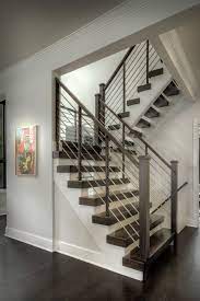 Dramatic Staircase With Open Woodblock Treads And Cable Railing Home Stairs Design House Stairs Stairs Design