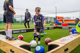 Snookball Soccer Pool Is All New To Melbourne It Combines Football With 8 Ball Pool For Heaps Of Fun For Kids Outside Games For Kids Football Pool 8ball Pool