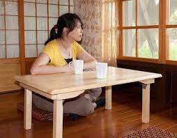 Sitting On The Floor Floor Table Flooring Floor Desk