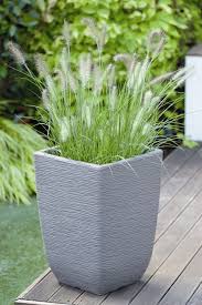 Designed with an understated elegance, our plant pots will add a luxe finish to your outdoor space. Cotswold Tall Planter 48cm Tall Limestone Grey Brookside Nursery