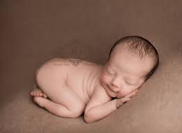The baby doll is sturdy, and only uses 1 aa battery. Asheville Newborn Baby Photographer Brandy Lewis Photography