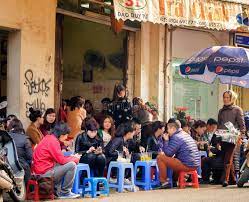 Crowded Hanoi Cafe Vietnam Men And Women Sit Outside In Low Chairs At A Crowde Sponsored Men Women Sit Vietnam Crowded Ad Hanoi Vietnam Photo