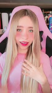 Engaging Indoor Scene with Blonde Individual in Pink