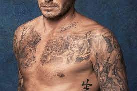 The international star has modeled for ad campaigns for emporio armani, h&m, and. A Close Up Tour Of David Beckham S Coolest Tattoos Chest Shoulder Male Skin Arm Muscle Facialhair Tru David Beckham David Beckham Tattoos Cherub Tattoo