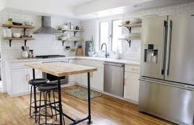 This kitchen island brings a stylish aesthetic to the kitchen with its faux marble top and iron base. 57 Trendy Diy Furniture Ideas Kitchen Butcher Blocks Kitchen Diy Diy Kitchen Remodel Kitchen Table Small Space Kitchen Island Remodel Ideas
