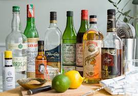 The 9 Bottle Bar A Guide To The Small Yet Mighty Home Bar Home Bar Essentials Bar Essentials Bar Drinks