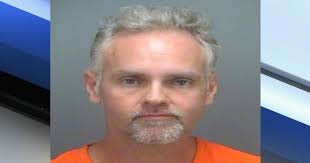 Father arrested for leaving children in hot car