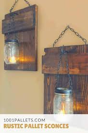 This mason jar sconce diy project is really easy, fun and will look good on your wall! Pallet Candle Holders 1001 Pallets