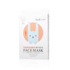 This is a bunny's face, which includes whiskers, eyes, and a mouth. Vegetable Bunny Face Mask 5 Pieces Usa Cosmetics