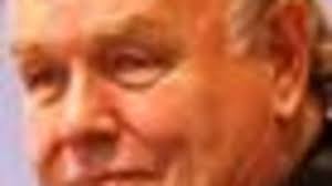 St John knights its new chancellor