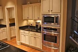 Vacuum up any debris before you even think of dipping that brush in paint. Painted Kitchen Cabinets By Bella Tucker Decorative Finishes Bella Tucker