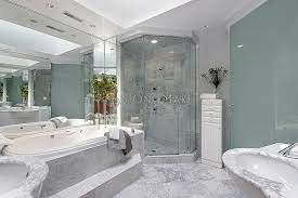 Master bathroom with victoria design looks suitable if you love the classic and classy concept. White Marble Shower Enclosure In Luxury Master Bathroom Modern Bathroom Tiles Small Bathro White Master Bathroom White Marble Bathrooms Luxury Master Bathrooms