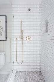 Blue hex tiles with white grout on the floor. Long White Subway Tiles With Marble Hex Shower Floor Transitional Bathroom Shower Floor Tile Shower Tile Subway Tiles Bathroom