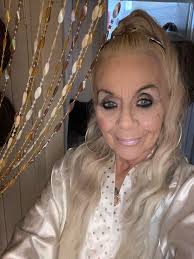 67 and this is a false claw clip wig lol 67 and 6 kids and 8 grandkids whey  hey lol just saying