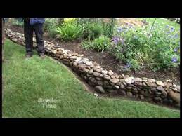 See more ideas about outdoor gardens, backyard landscaping, garden inspiration. Garden Rock Wall Youtube