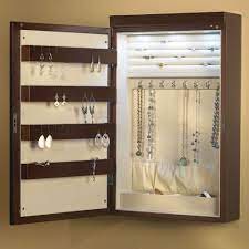 Maybe you would like to learn more about one of these? The 24 Wall Mounted Illuminated Jewelry Armoire Hammacher Schlemmer