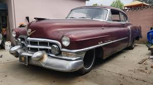 Image result for Burgundy Maroon 1952 Cadillac