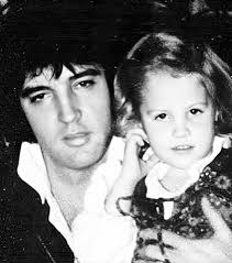 June 30, 1972: Elvis Presley and Mary Kathleen Selph, riding his 1971  Harley-Davidson FLH Electra-Glide motorcycle in Memphis at the corner of  South Parkway and Elvis Presley Boulevard. Kathy, was a dancer