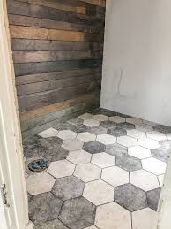 Wood plank porcelain tile has been intergrated into the coastal design that has become very popular in florida. Hexagon Bathroom Tile And Wood Plank Wall Diy Show Off Diy Decorating And Home Improvement Blogdiy Show Off Diy Decorating And Home Improvement Blog