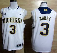 On the inside it has the nike elite logo and the outside that's visible below has a block m on it. Cheap Ncaa Adidas Michigan Wolverines 3 Trey Burke White College Basketball Jersey Big 10 Patch For Sale