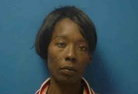 Woman accused of bare-hand castration