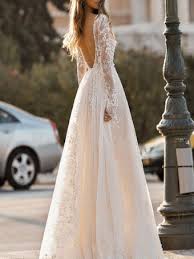 With delicate french lace, a beautiful low cut back, and an airy train, this simple yet romantic wedding dress can work for a traditional wedding, boho look, and everything in between. Boho Wedding Dress Bohemian Wedding Dress Online Milanoo Com