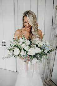A Gorgeous Minimal White Washed Barn Wedding In All White White Rose Wedding Bouquet White Roses Wedding Wedding