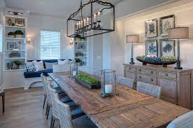 In this open dining room, muted brick, warm wood tones and matte black combine for a timeworn yet fresh feel. The 10 Most Popular Dining Rooms On Houzz Right Now