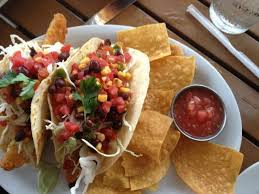 Alternatively, wrap 1 to 3 tortillas in a damp paper towel and microwave for 30 seconds, until warm. Two Fish Tacos On Corn Flour Tortillas Picture Of Glory Days Grill Tampa Tripadvisor