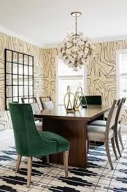 Emerald Green Velvet Head Chairs And Heather Gray Dining Chairs Sit On A White A Emerald Green Dining Room Velvet Dining Room Chairs Velvet Dining Chairs